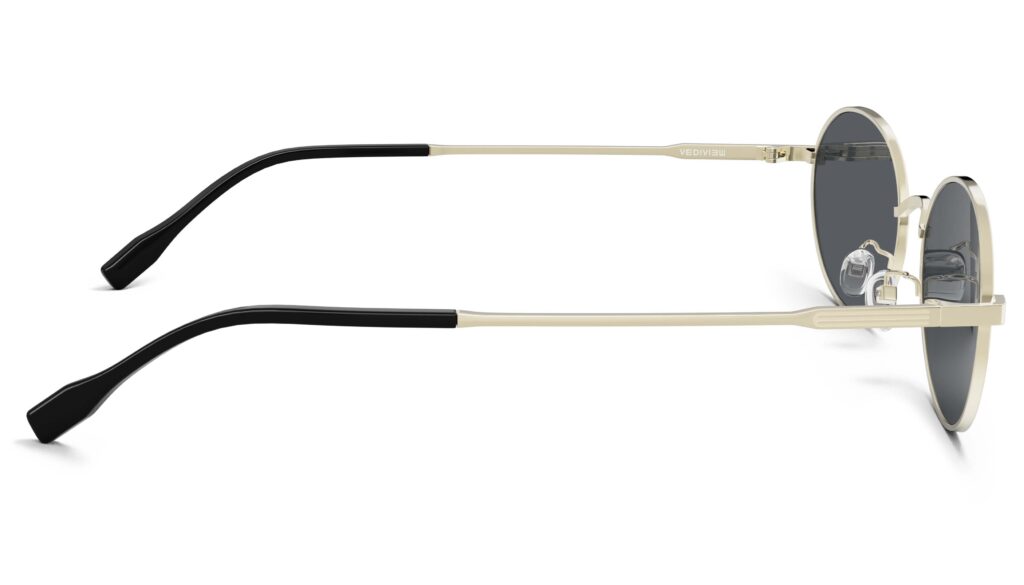 Side view of Alva gold oval sunglasses with grey polarized lenses from Vediview